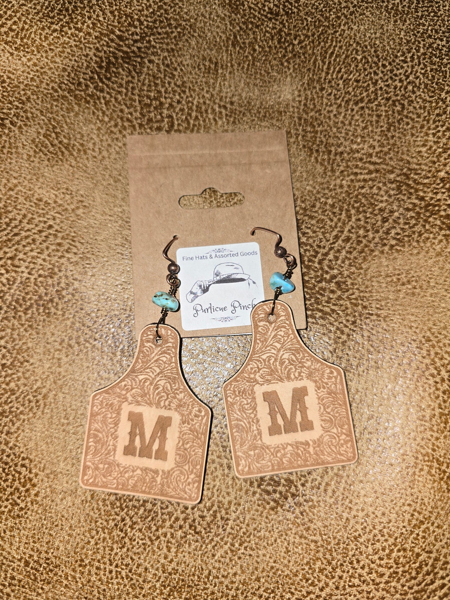 Burned Leather Cow Tag Earrings with Initial “M” and Turquoise Beads