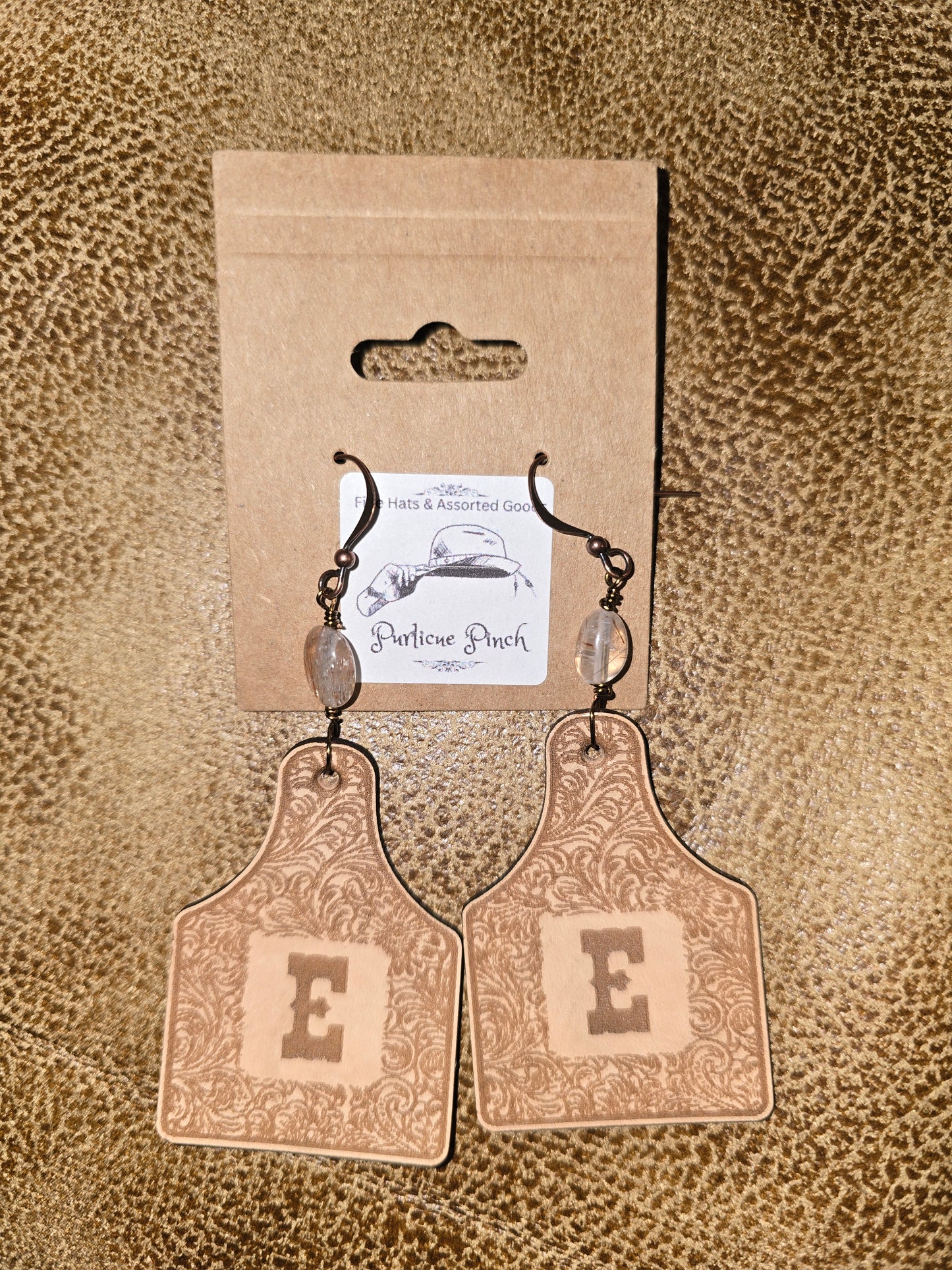 Burned Leather Cow Tag Earrings with Initial “E” and Red Copper Super 7 Pebble Beads