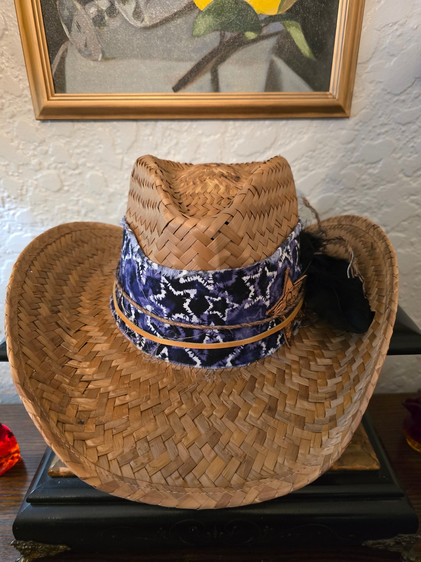 Rugged Straw Cowboy Hat with Star Print Hatband & Black Feathers